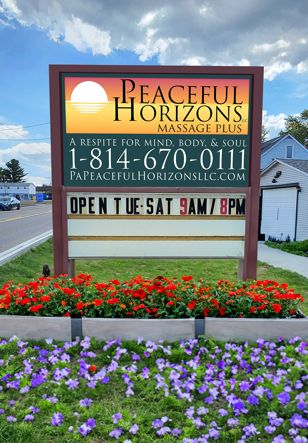 Peaceful Horizons Sign with flower bed Peaceful Horizons Sign with flower bed